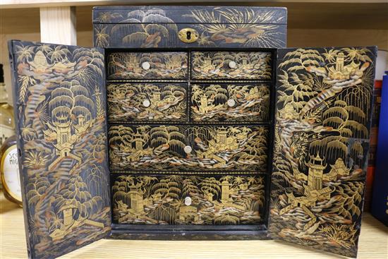 A Regency Japanned chinoiserie cabinet